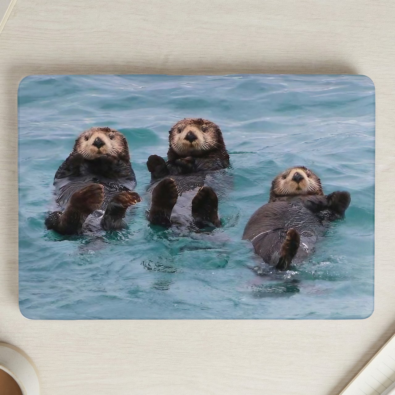 Floating Sea Otters MacBook Case