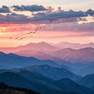 Pink Sunset Over Mountain Range