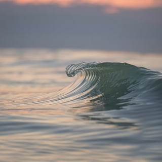 Calm Glassy Wave at Sunrise